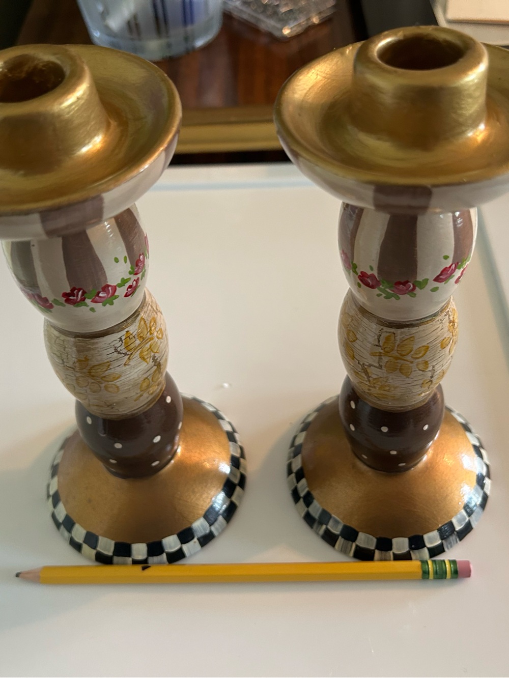 Set of two hand painted candlestick holders